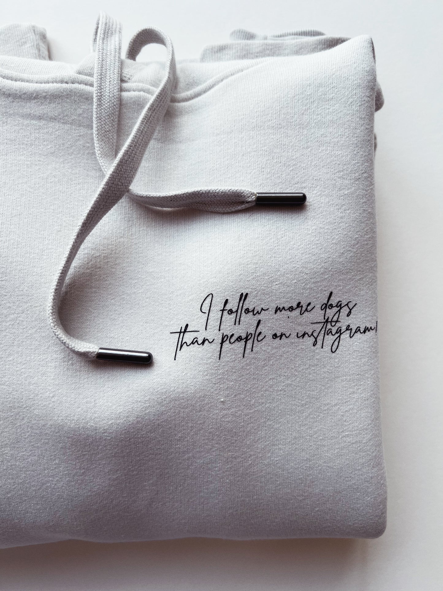 Hoodie 'I follow more dogs than people'